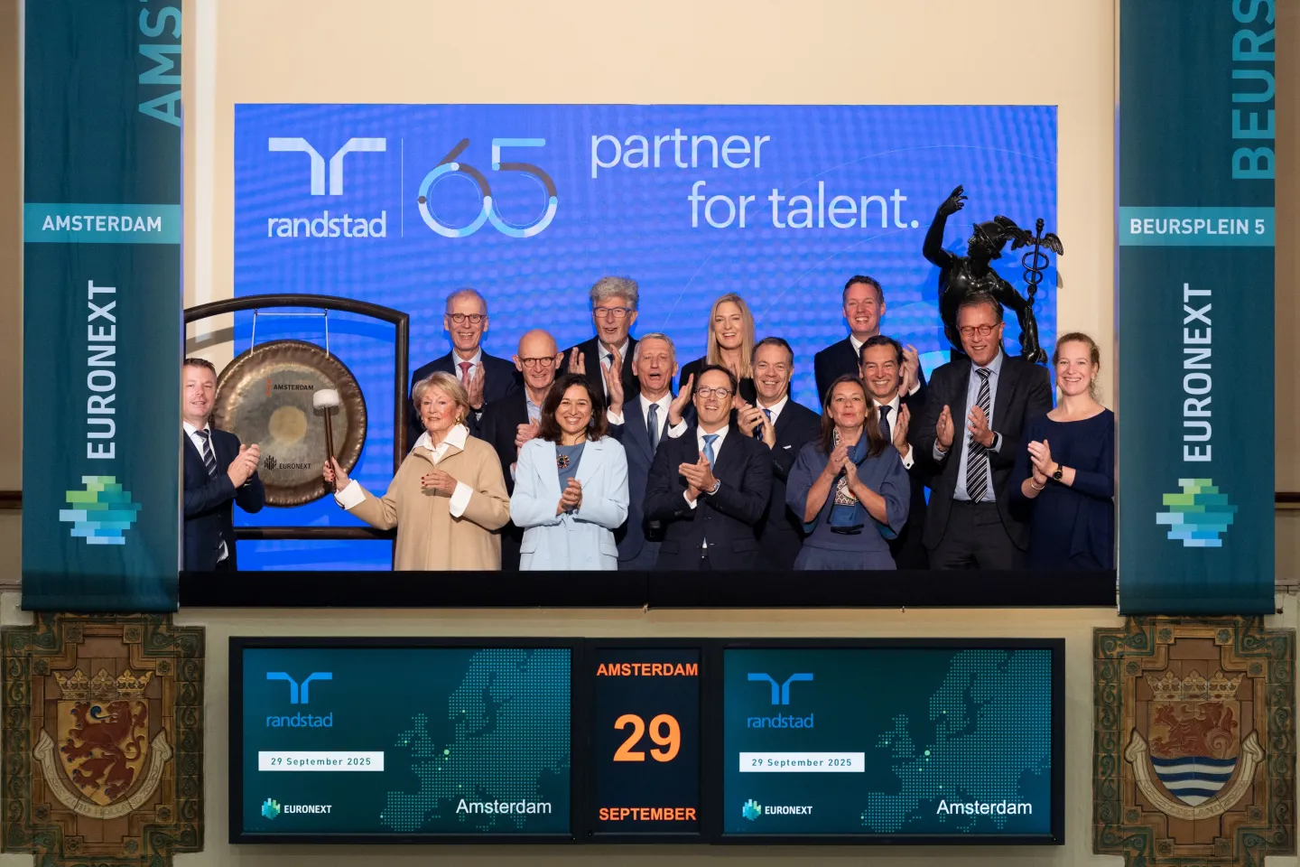 Randstad celebrates 65 years with a gong ceremony at the Amsterdam Stock Exchange by Petra Goldschmeding